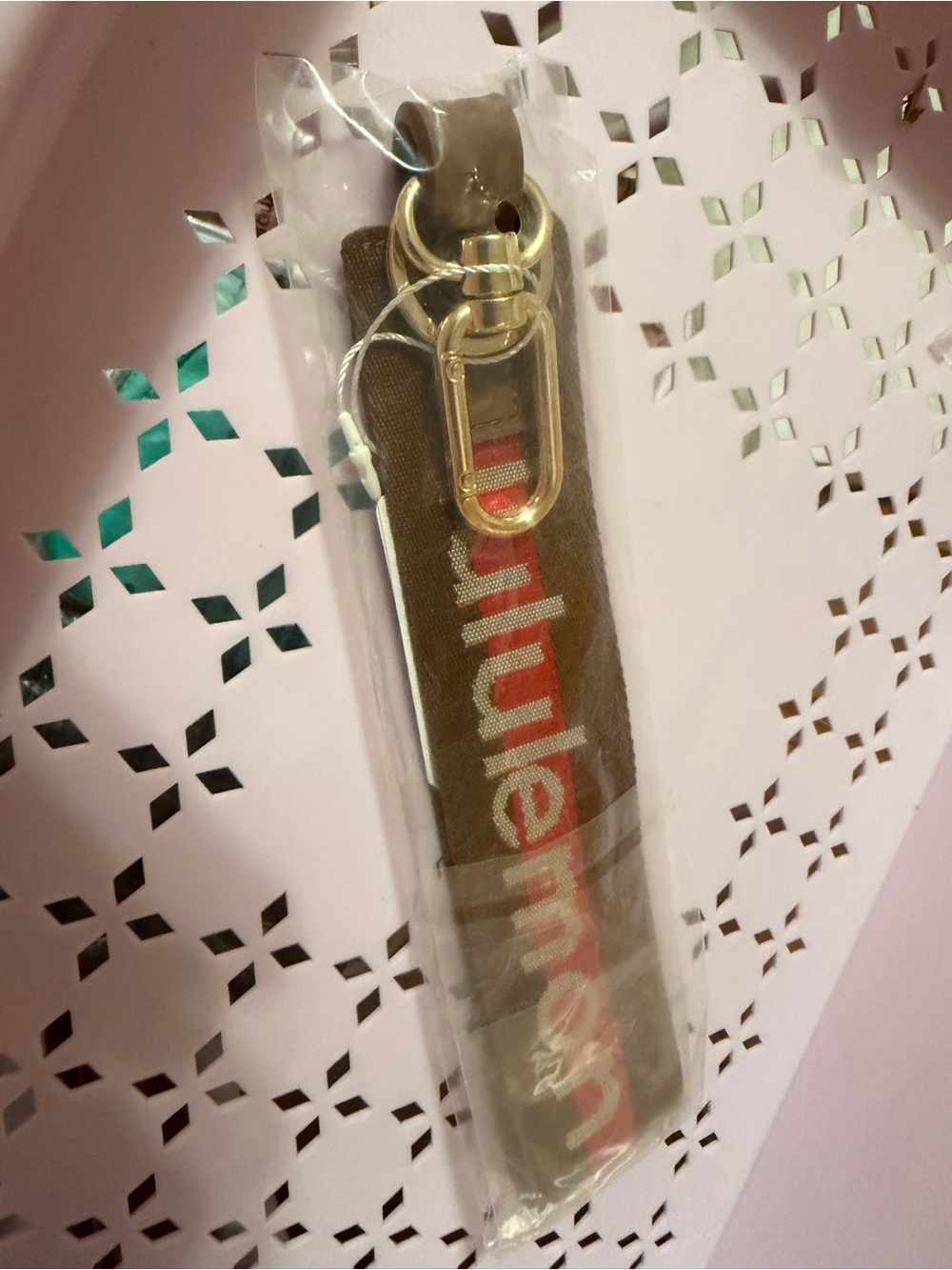 Lululemon Brown Wrist Strap Keychain with Gold Hardware